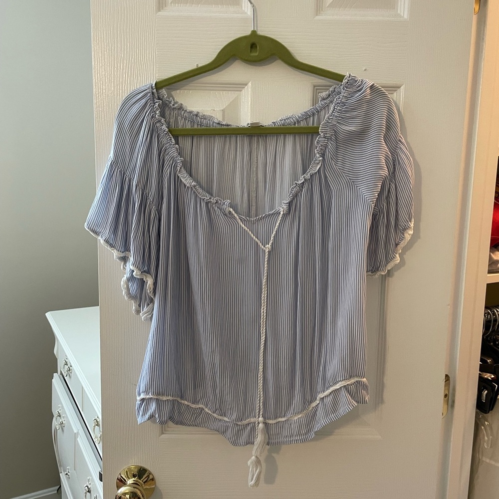 Blue and white striped off-the-shoulder blouse